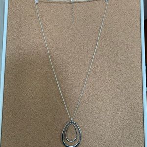 Silver necklace with double ring pendant